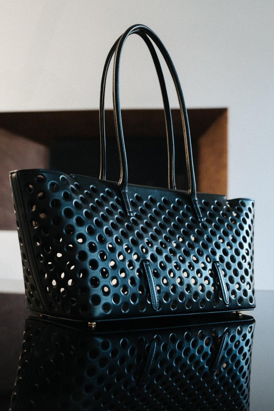 Neo Mina 20 perforated leather top handle bag
