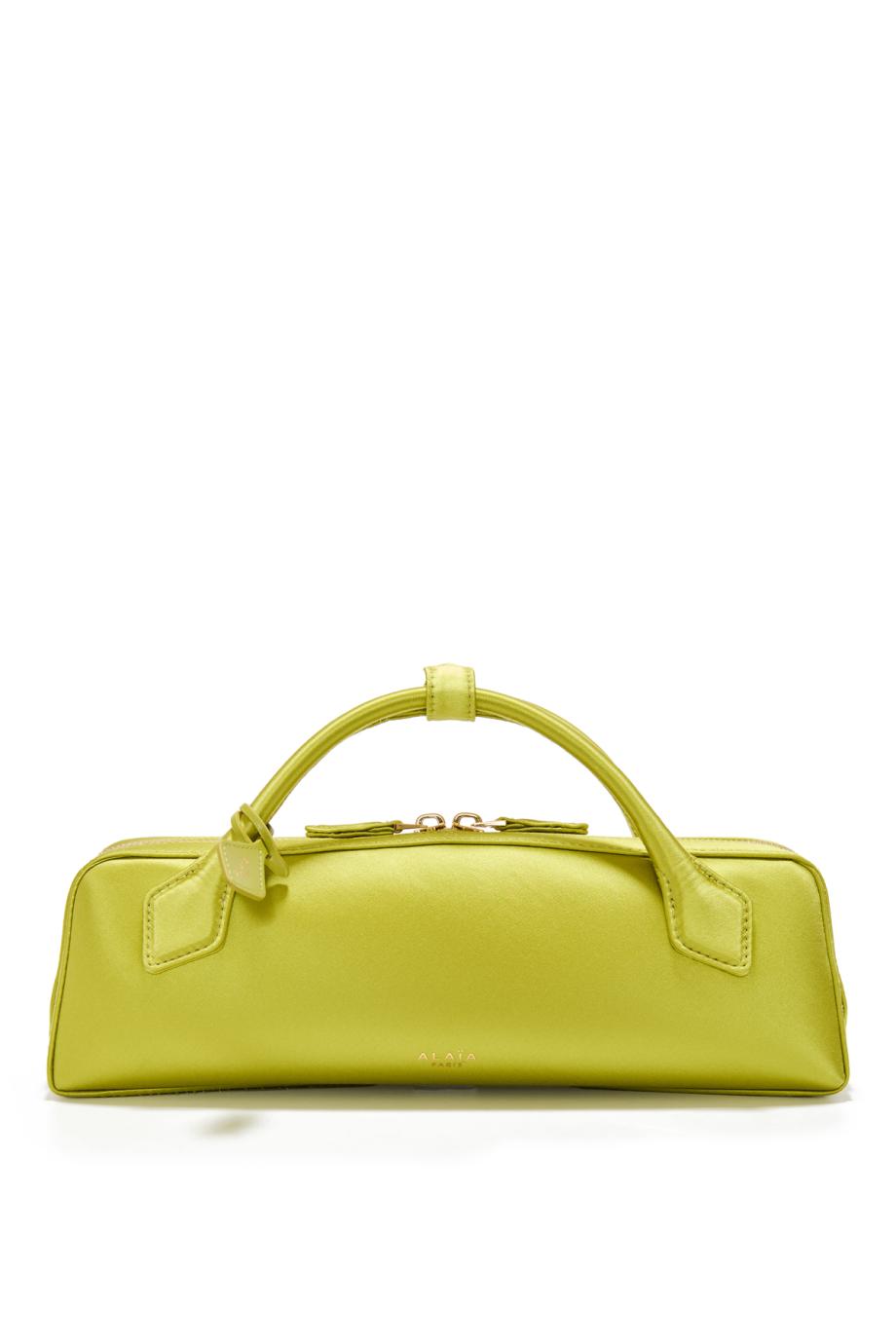Le Teckel satin clutch in lime