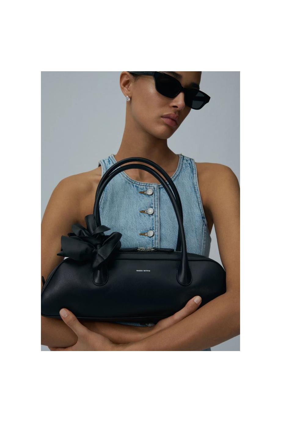 Brigitte trapeze leather bag in black 