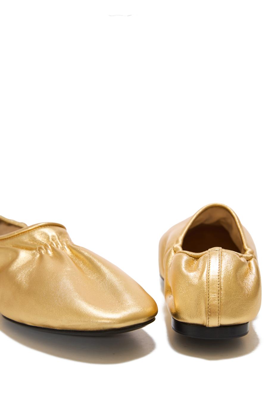 Metallic leather slippers in gold