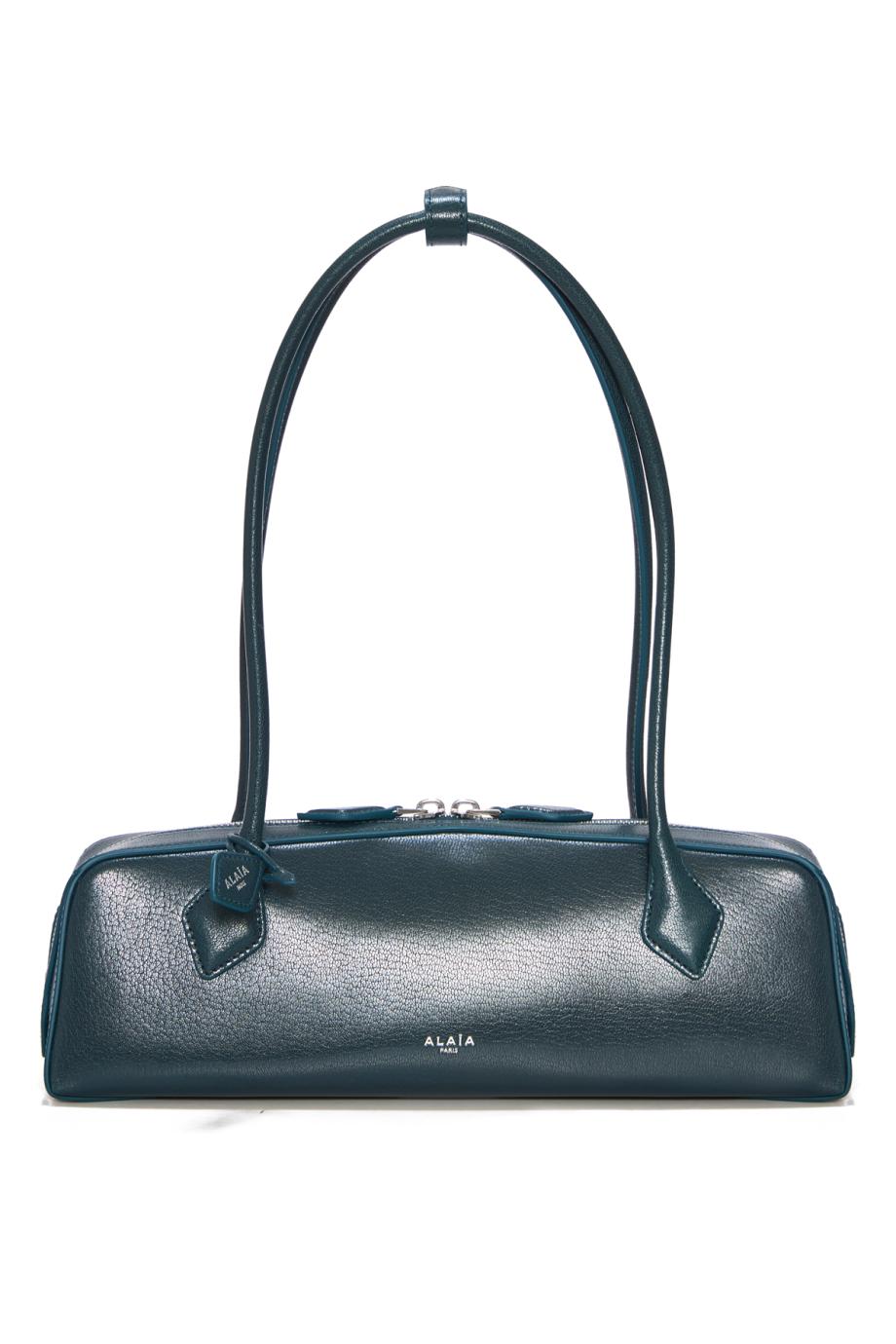 Le Teckel leather shoulder bag in blue paon
