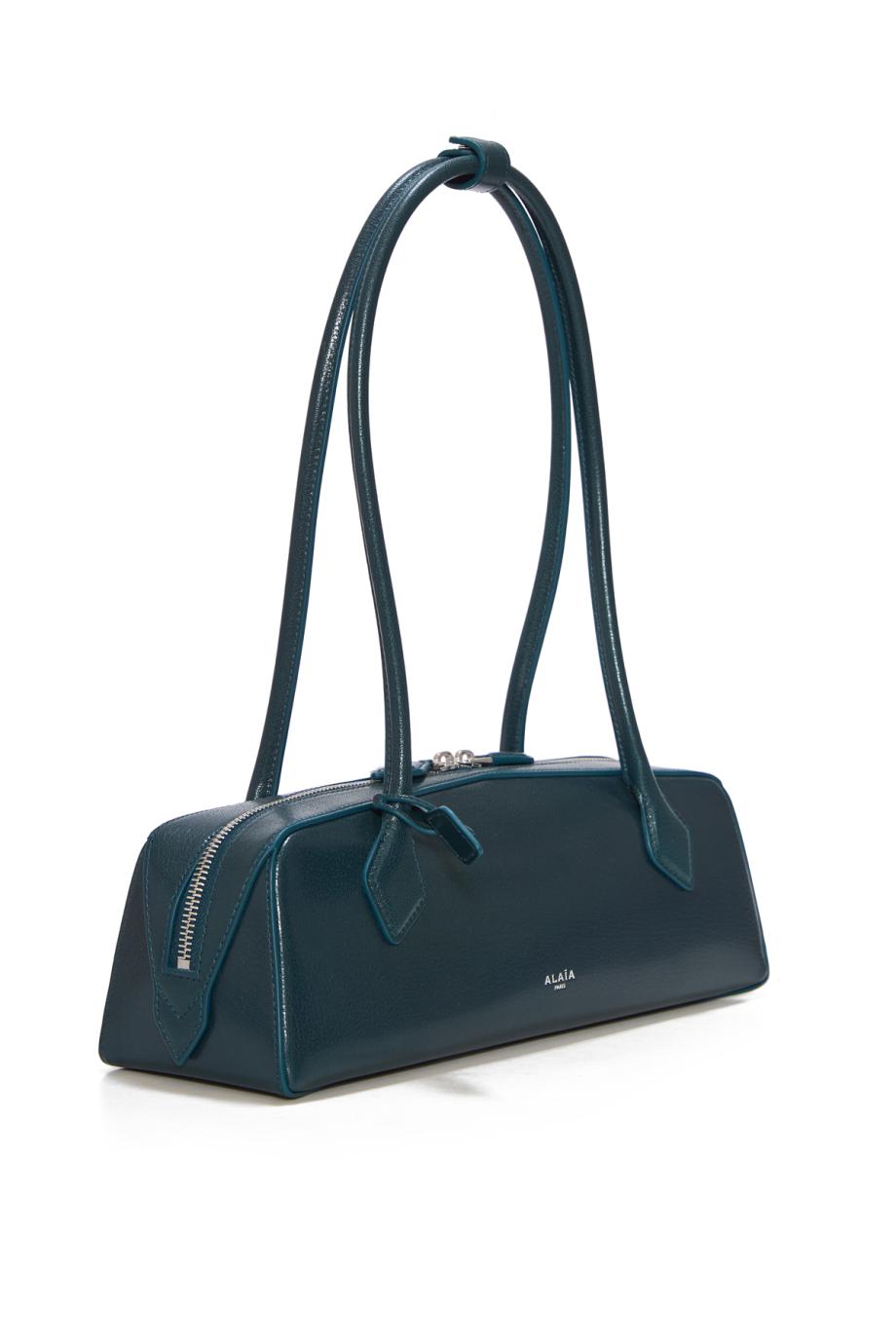 Le Teckel leather shoulder bag in blue paon