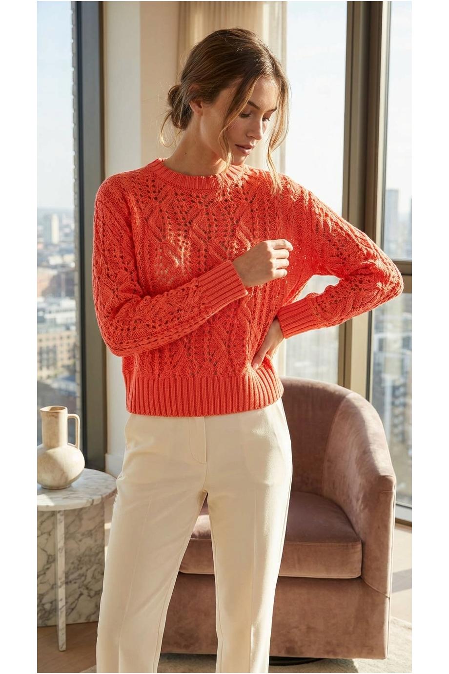 Knitted cashmere and cotton sweater in sunset