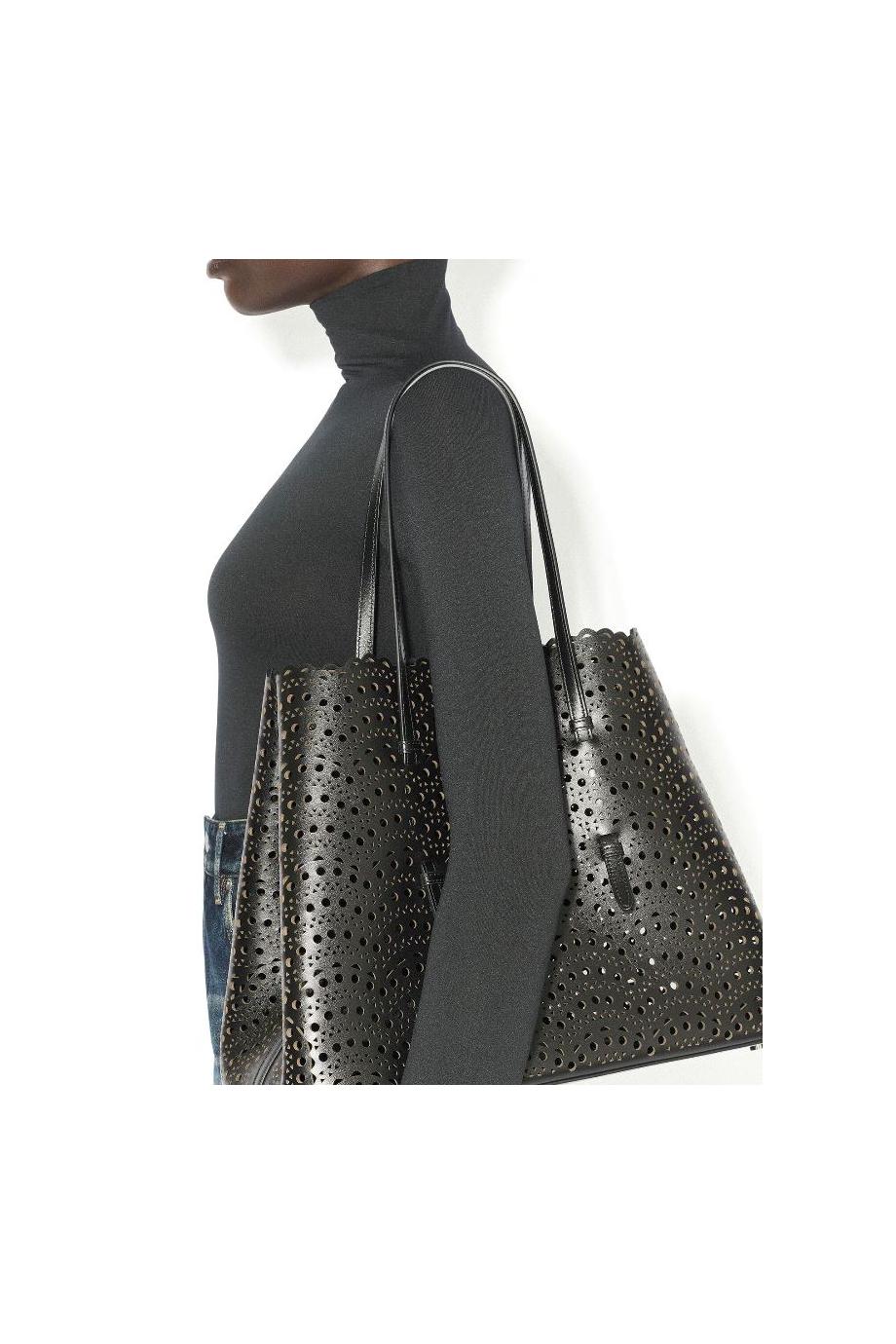 Le Mina 37 leather top handle bag in black