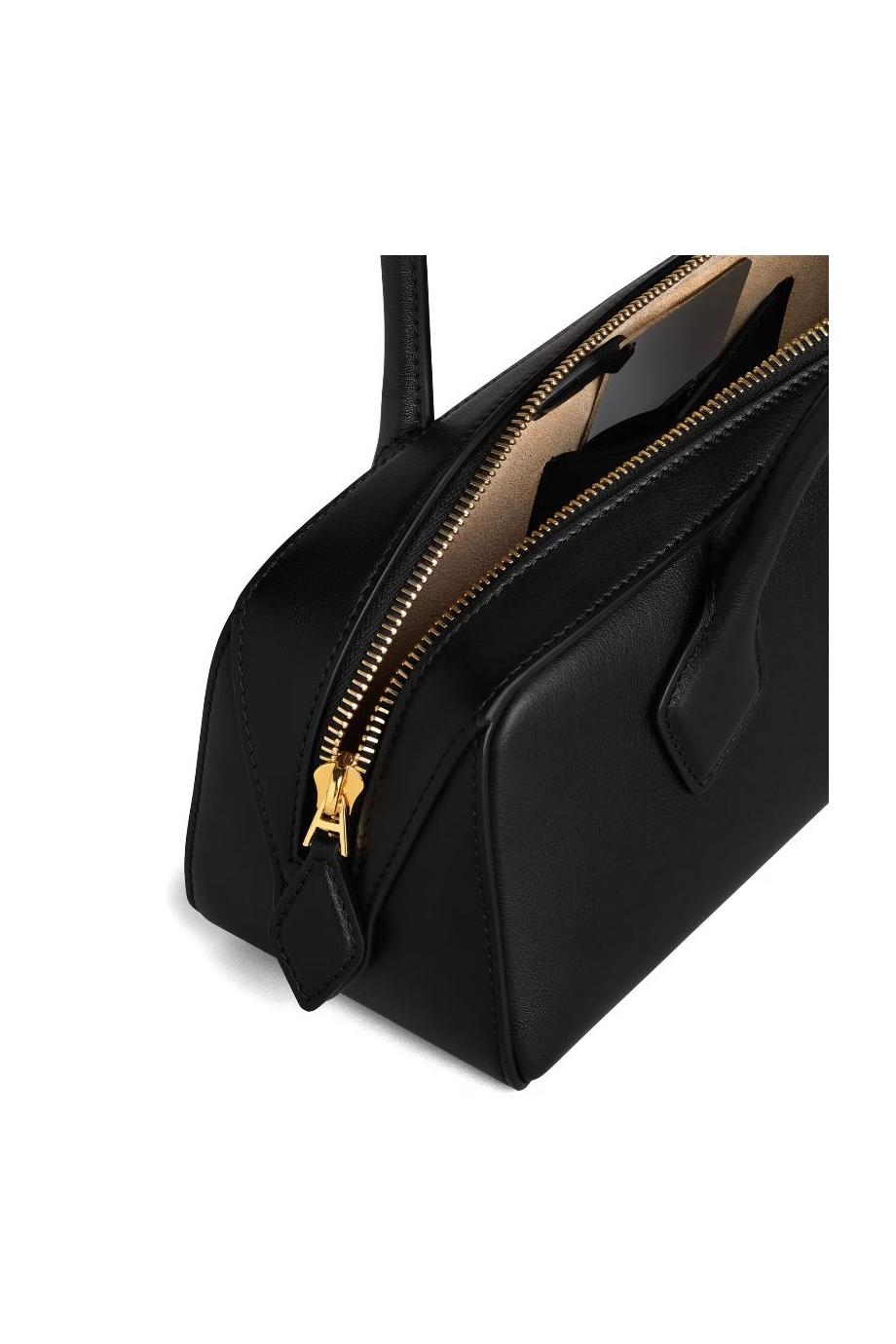 Le Teckel leather top handle bag in black