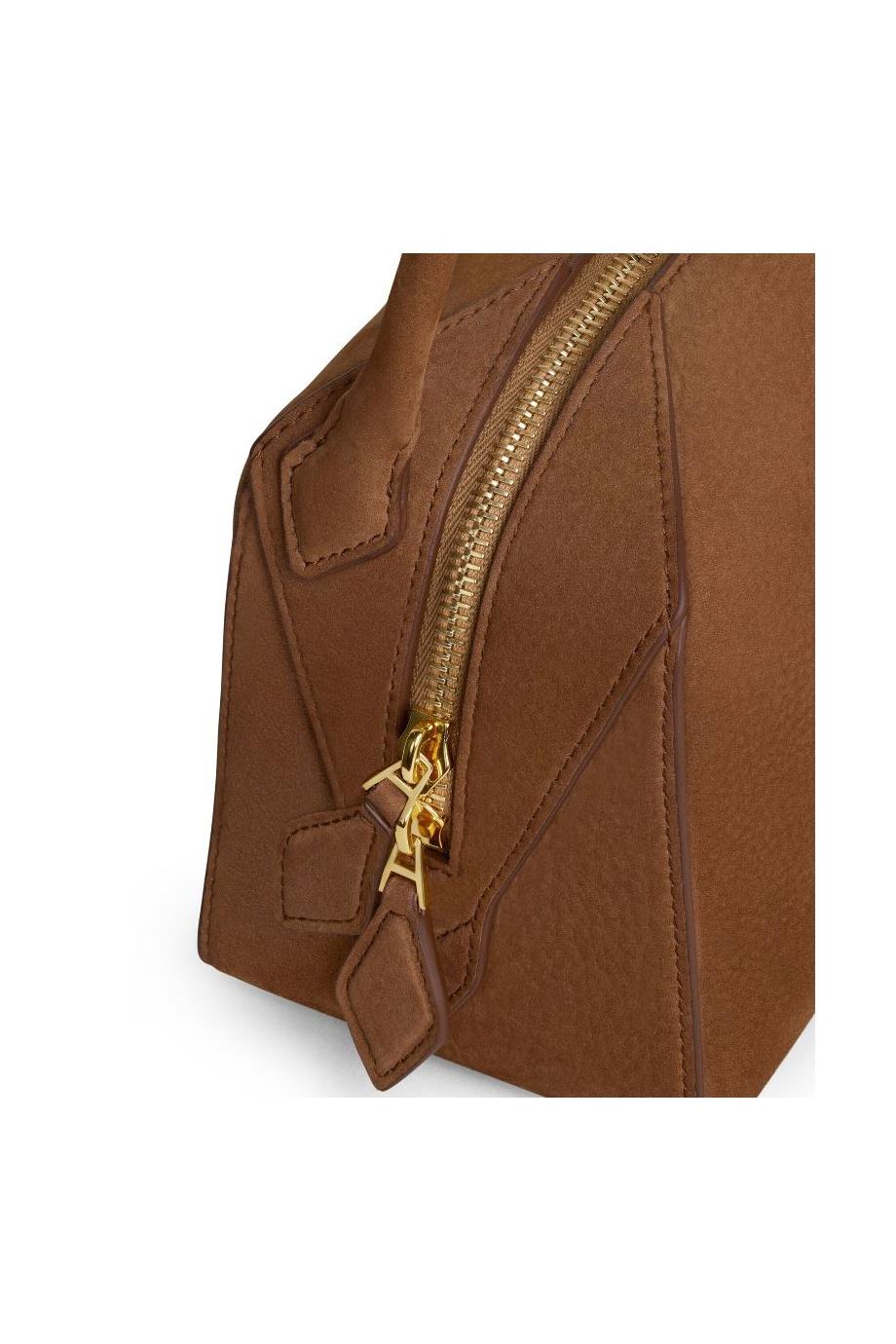 Le Bouledogue suede top handle bag in terre