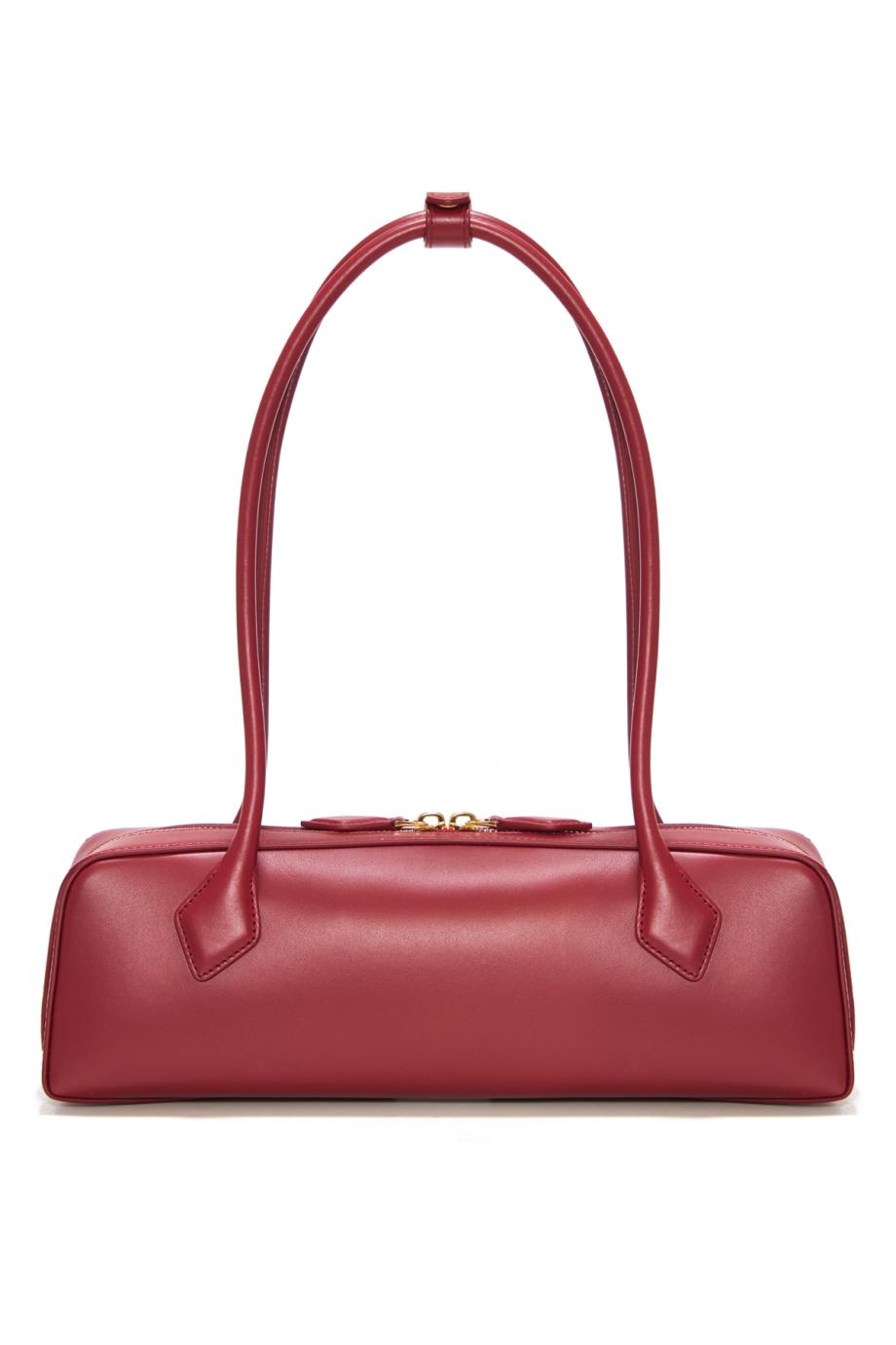 Le Teckel leather top handle bag in rouge carmin