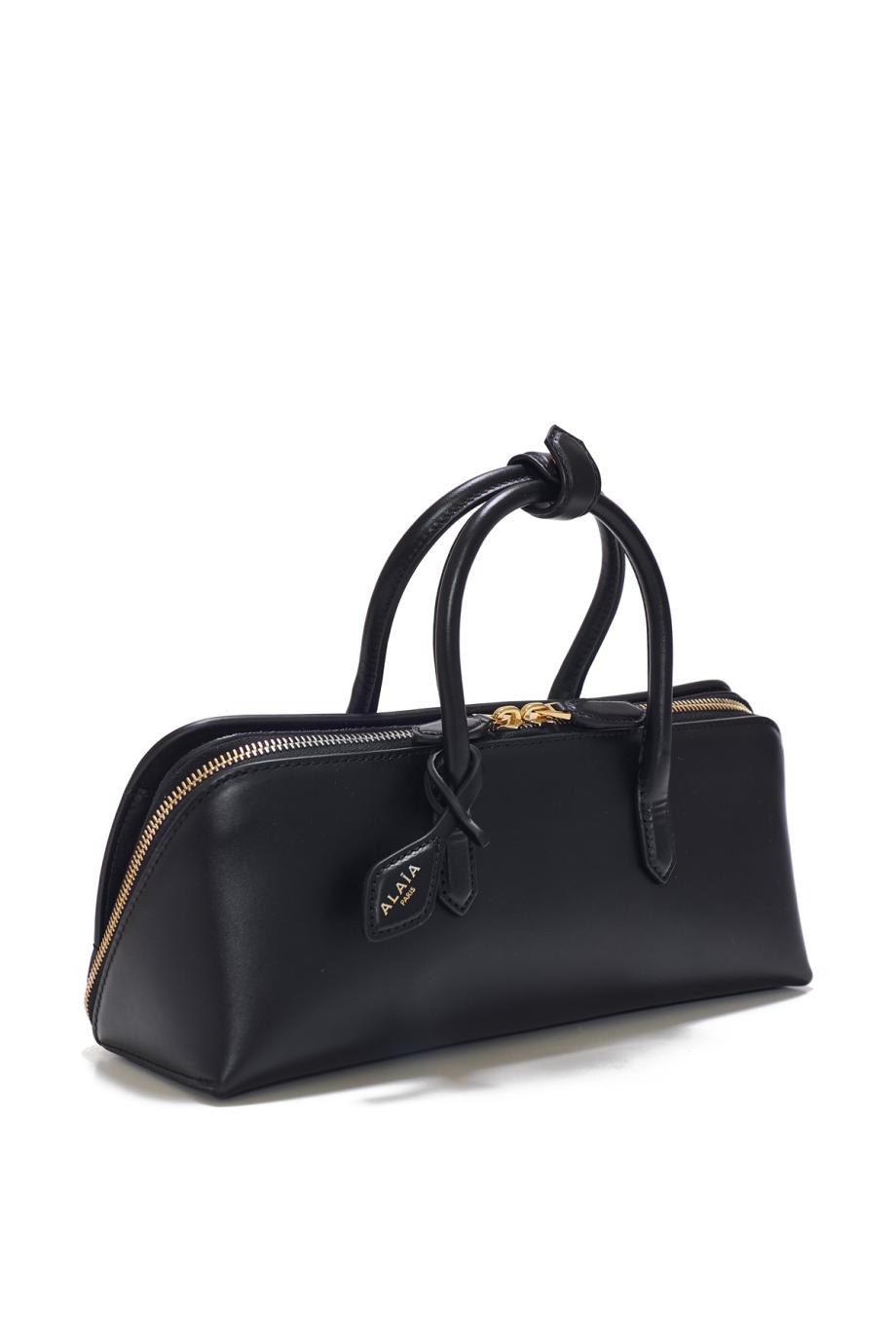 Delta leather small top handle bag in black