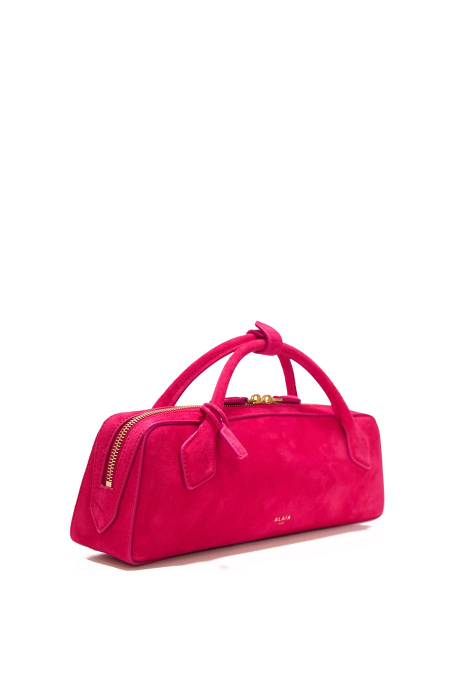 Le Teckel suede top-handle clutch in dalia