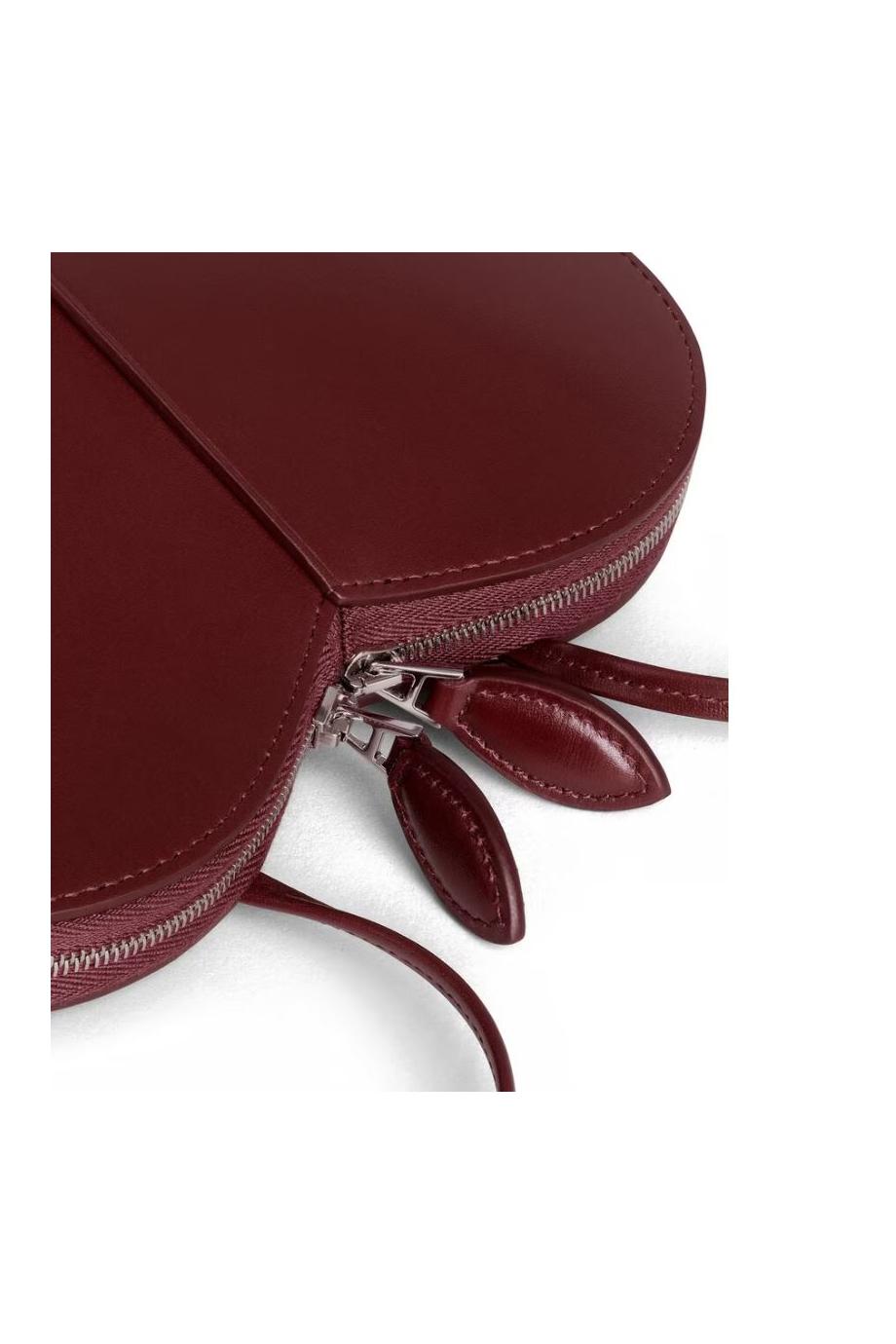 Le Coeur calfskin bag in rouge grenat