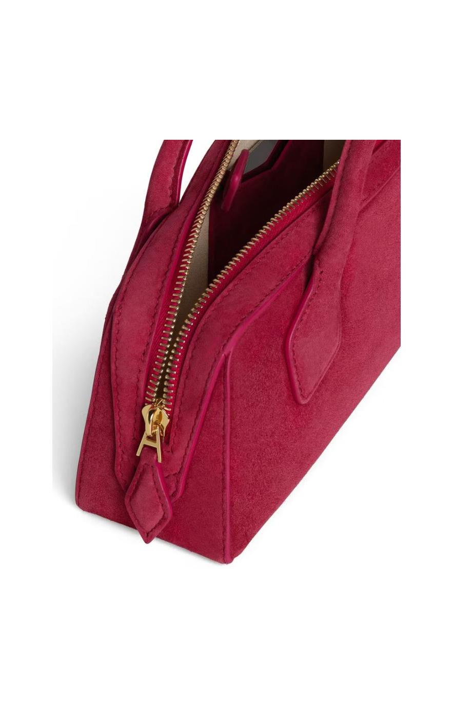 Le Teckel suede top-handle clutch in dalia