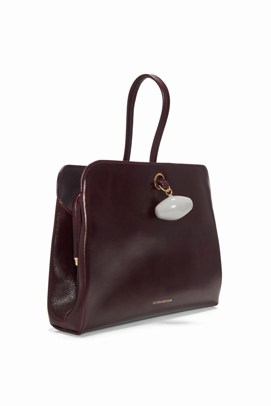 Kizette leather clutch bag in dark burgundy