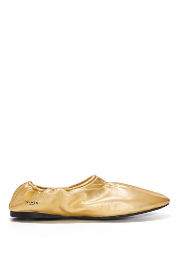 Metallic leather slippers in gold