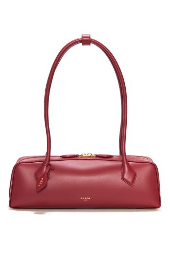 Le Teckel leather top handle bag in rouge carmin